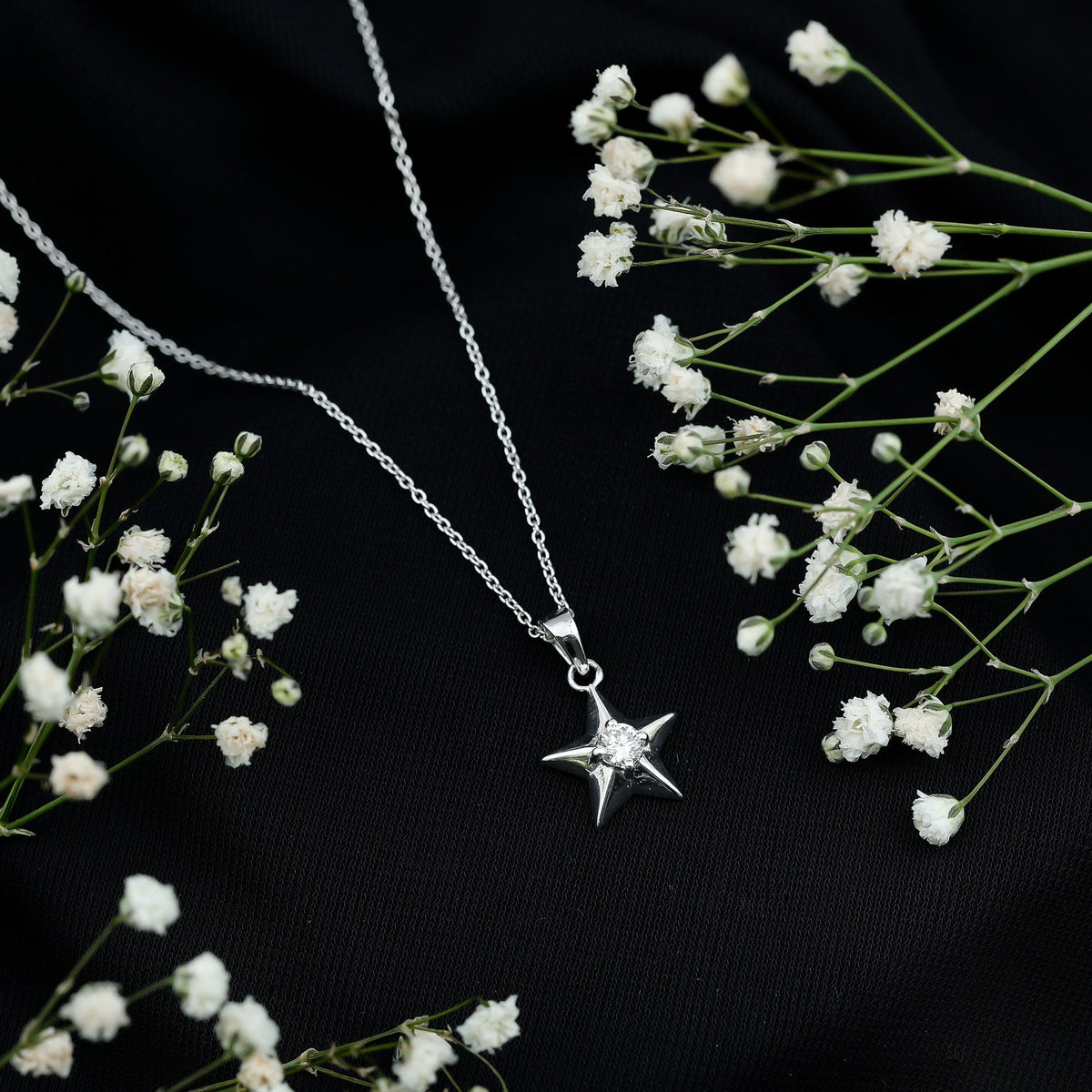 Certified diamond star pendant necklace by Rosec Jewels with a shining star-shaped pendant on a delicate chain.