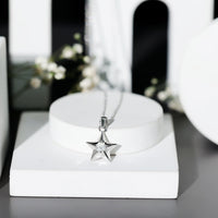 Certified diamond star pendant necklace from Rosec Jewels featuring a sparkling diamond star pendant on a delicate chain.