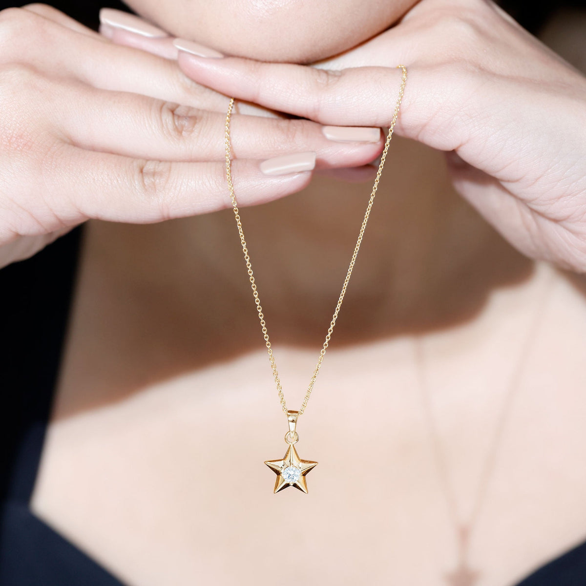 Certified diamond star pendant necklace by Rosec Jewels featuring a sparkling star-shaped pendant with a chain.
