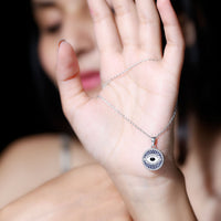 Sterling Silver Evil Eye Necklace with Blue Sapphire and Moissanite