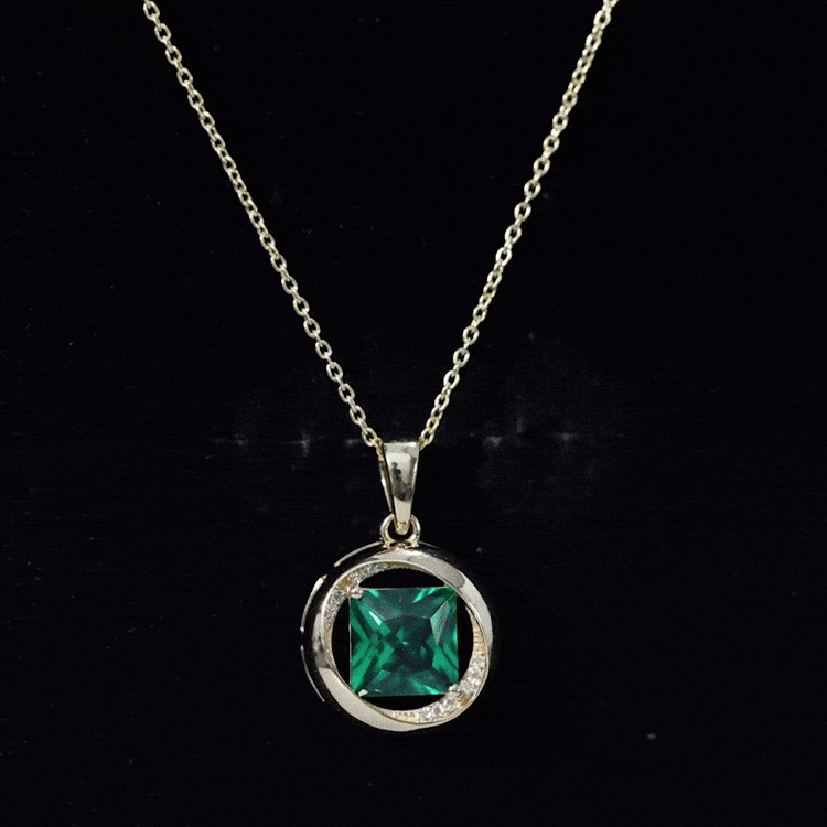 Yellow gold pendant featuring a 2.4 carat lab-created emerald princess cut gemstone with diamond accents by Rosec Jewels.