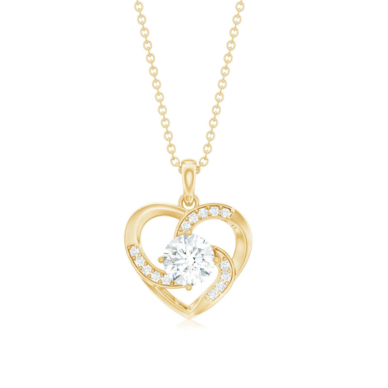 Lab grown diamond solitaire heart pendant by Rosec Jewels, featuring a sparkling heart-shaped diamond on a delicate chain.