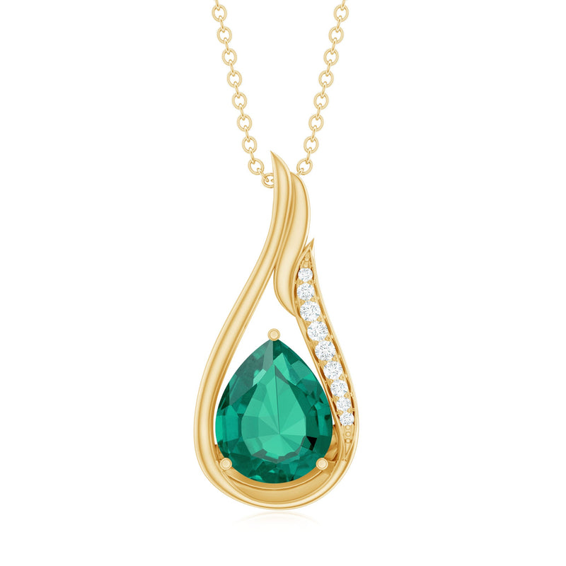 Lab-grown emerald teardrop pendant from Rosec Jewels featuring a sparkling green gemstone on a delicate chain.