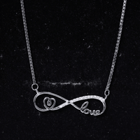 Sterling Silver Cubic Zirconia Infinity Necklace with Heart and Love