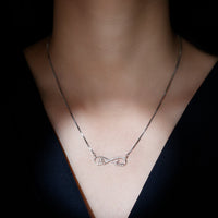 Sterling Silver Cubic Zirconia Infinity Necklace with Heart and Love