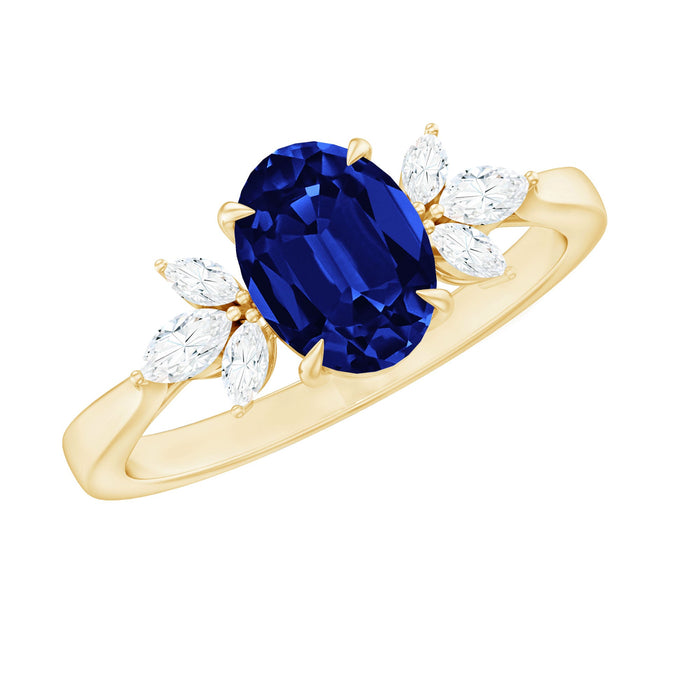 Oval lab-grown blue sapphire engagement ring with diamond trio accents, crafted by Rosec Jewels.