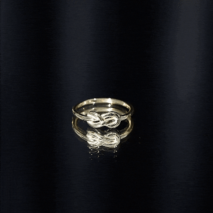 Yellow gold infinity knot promise ring for women by Rosec Jewels, featuring a delicate intertwined design.