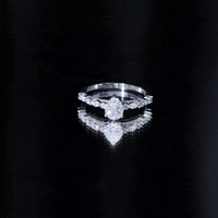 Solitaire Moissanite Teardrop Engagement Ring with Surprise Band