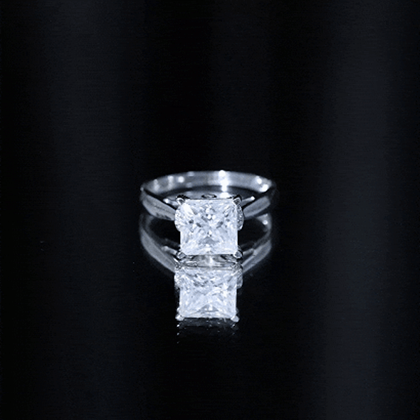 Yellow gold princess cut certified moissanite solitaire engagement ring by Rosec Jewels featuring a sparkling center stone.