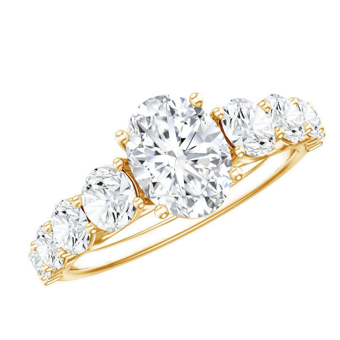 Oval cut moissanite side stone engagement ring with a 1.2 carat center, featuring intricate band details, by Rosec Jewels.