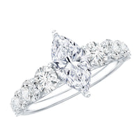 Marquise moissanite engagement ring with side stones from Rosec Jewels, showcasing a sparkling central stone and elegant design.