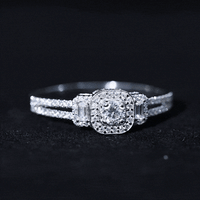 Vintage-inspired moissanite engagement ring with intricate metalwork and sparkling center stone, crafted by Rosec Jewels.