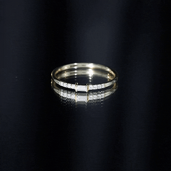 Yellow gold moissanite minimalist stackable promise ring by Rosec Jewels, featuring a sleek, modern design with sparkling stones.