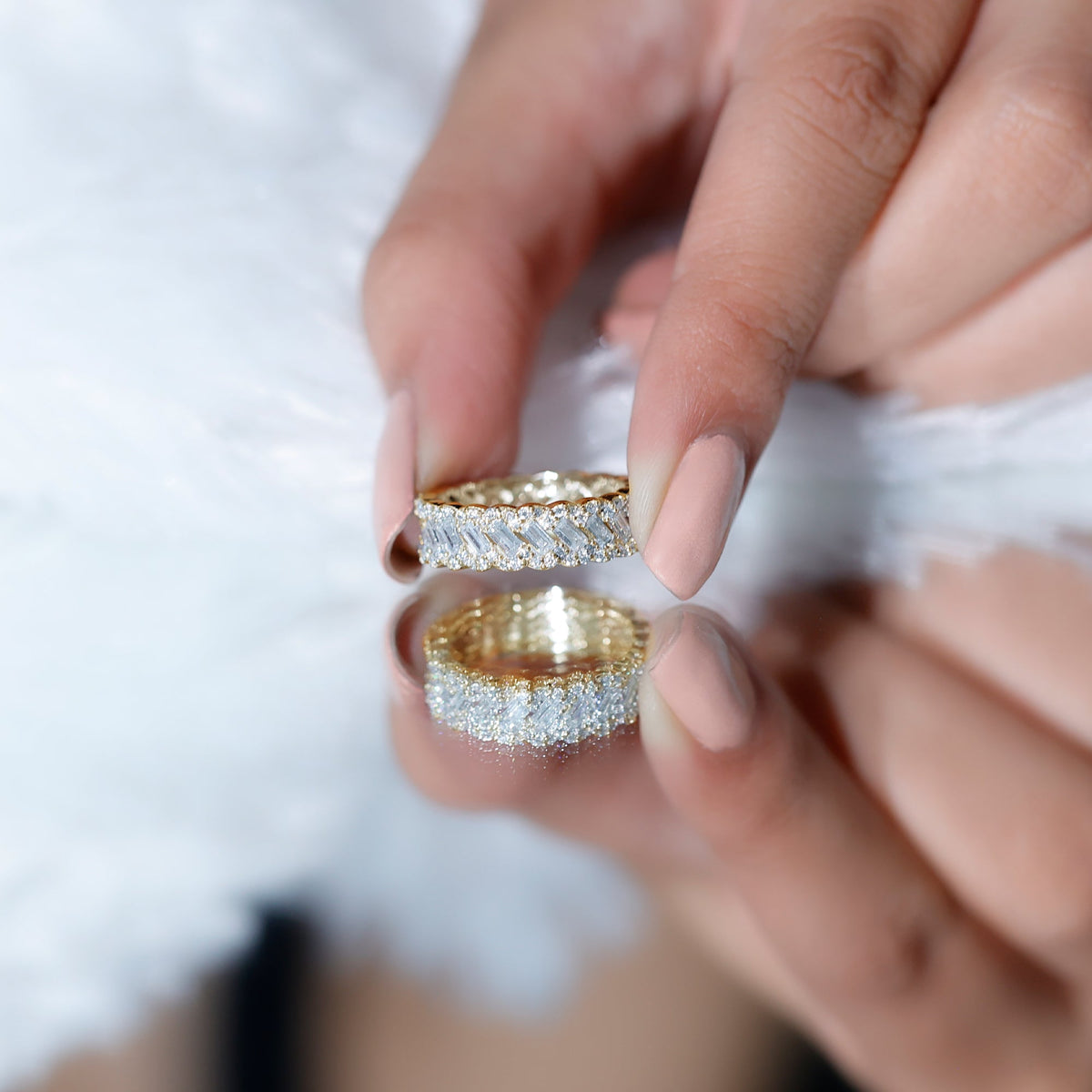 Rosec Jewels moissanite braided wedding band featuring a baguette and round stones, crafted in elegant ring style.