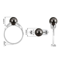 Tahitian pearl solitaire engagement ring with split shank and diamond accents by Rosec Jewels, showcasing elegant jewelry design.