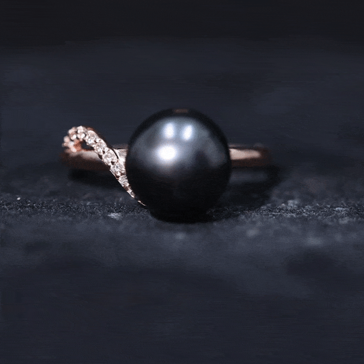 Yellow gold Tahitian pearl solitaire engagement ring with a diamond accent, crafted by Rosec Jewels.