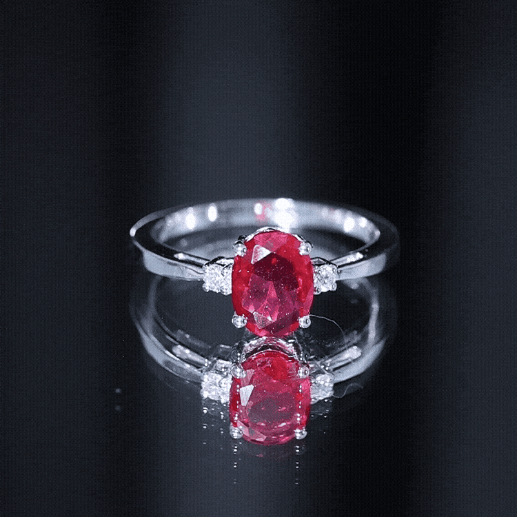 Yellow gold oval lab-grown ruby engagement ring with diamond accent, crafted by Rosec Jewels.