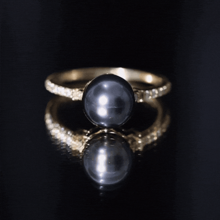 Rosec Jewels classic black pearl ring with diamond side stones, featuring a sleek black pearl centerpiece and sparkling accents.