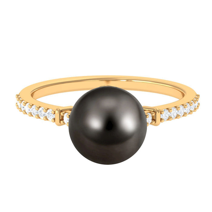 Black pearl ring with diamond side stones from Rosec Jewels, showcasing a classic design and elegant craftsmanship.