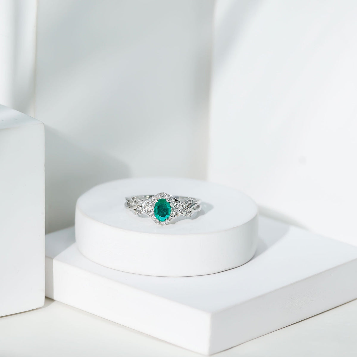 Designer Emerald Oval Engagement Ring with Diamond Halo