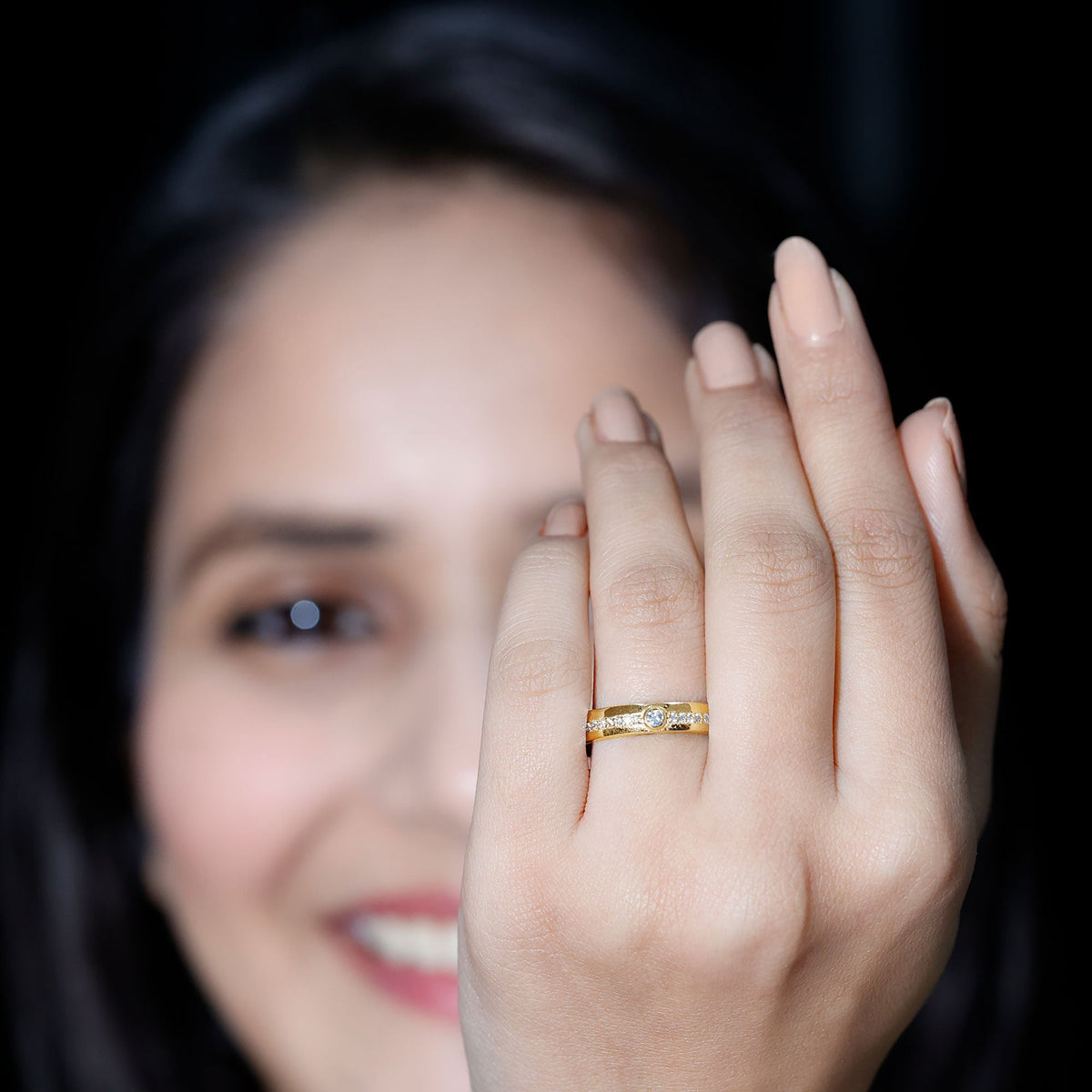Bezel set diamond unisex wedding band from Rosec Jewels, showcasing a sleek design with sparkling diamonds on a silver ring.