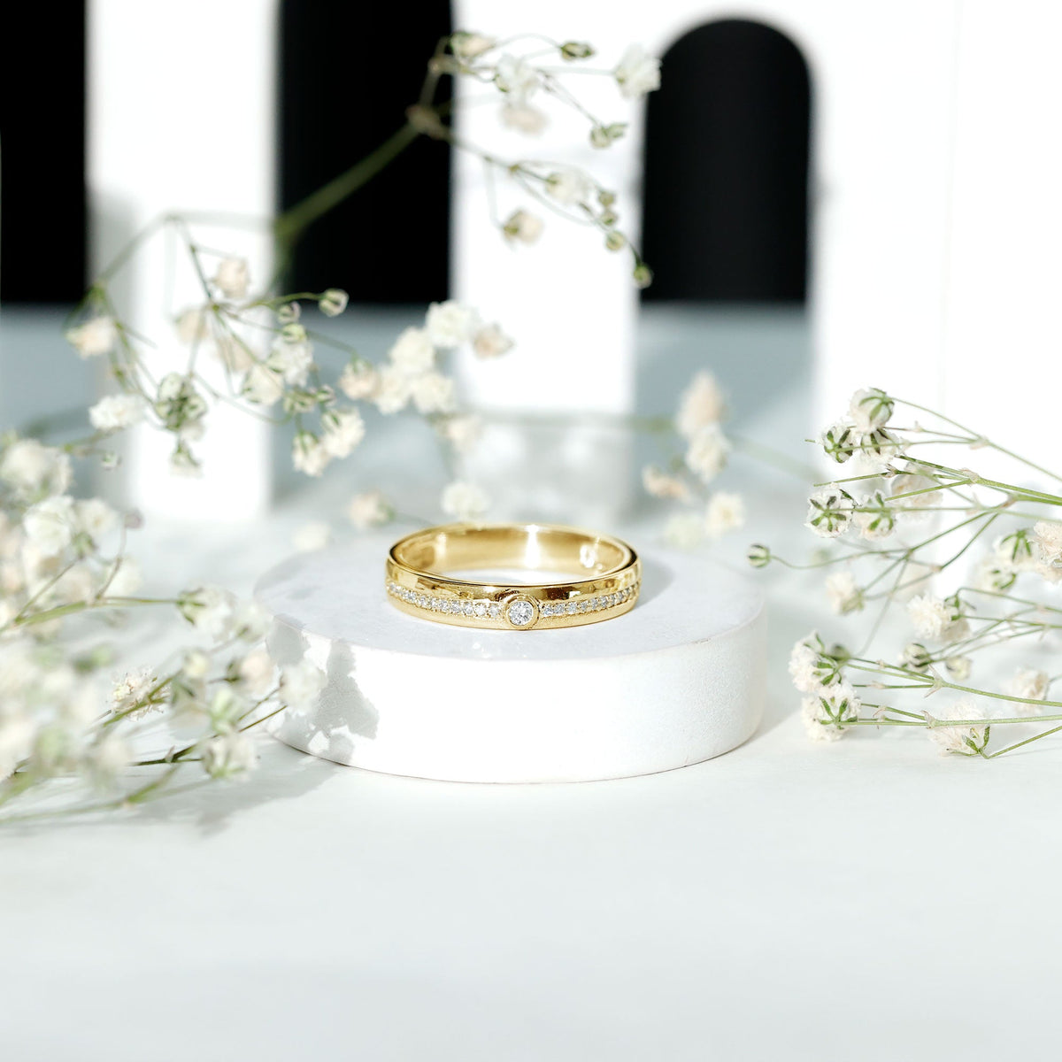 Bezel set diamond unisex wedding band from Rosec Jewels, featuring a sleek ring design with sparkling diamonds.