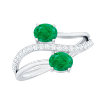 Natural certified emerald two-stone engagement ring with diamond accents, featuring a gold band from Rosec Jewels.