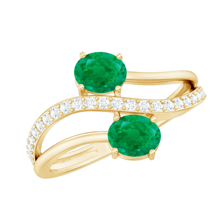 Natural certified emerald two-stone engagement ring with diamond accents from Rosec Jewels showcasing the elegant design and vibrant gemstones.