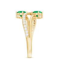 Natural certified emerald two-stone engagement ring with diamond accents from Rosec Jewels, showcasing a green emerald and sparkling diamonds.