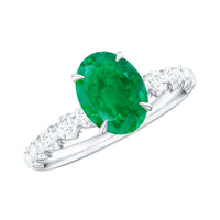 Natural 6x8mm emerald oval engagement ring by Rosec Jewels with diamond side stones, showcasing a stunning green gemstone and sparkling accents.