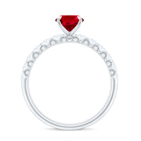 Oval lab-grown ruby engagement ring with diamond accents, Rosec Jewels, showcasing a 1.5 carat certified gemstone and elegant design.