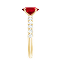 Certified 1.5 carat lab-grown ruby oval engagement ring with diamonds by Rosec Jewels showing the ring's detailed design and sparkle.