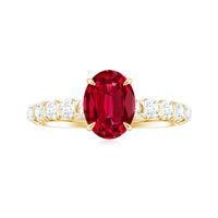 Lab-grown 1.5 carat ruby oval engagement ring with diamond accents by Rosec Jewels, showcasing a stunning gemstone and elegant design.