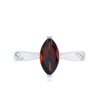 Natural solitaire garnet marquise engagement ring with diamond accents from Rosec Jewels, showcasing a marquise-shaped garnet centerpiece.