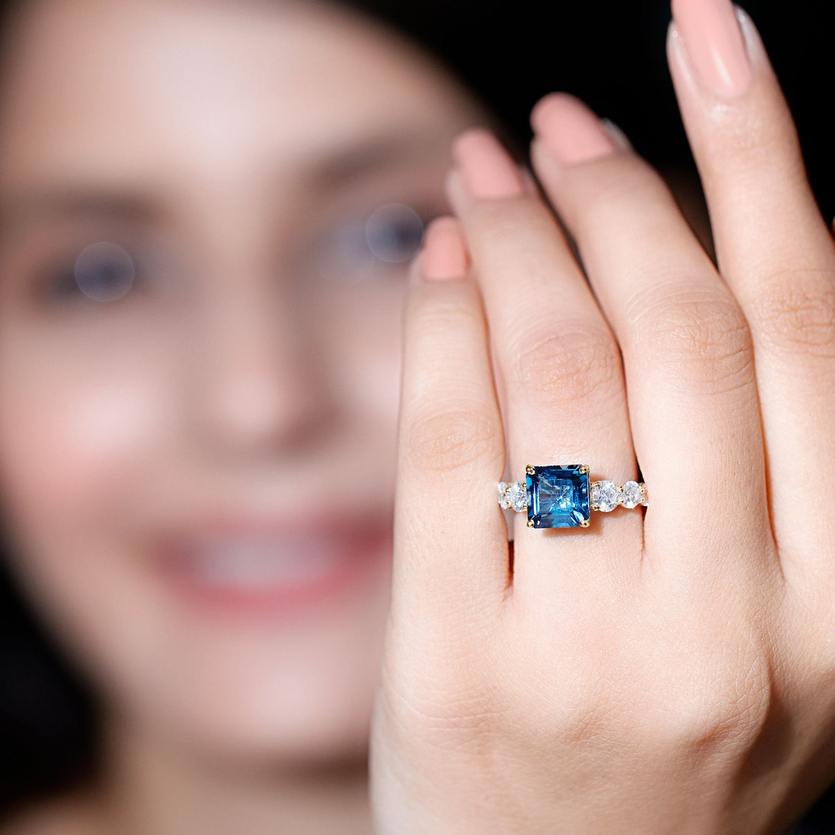 Asscher cut London Blue Topaz solitaire engagement ring with Moissanite accents by Rosec Jewels, showcasing the elegant ring design.