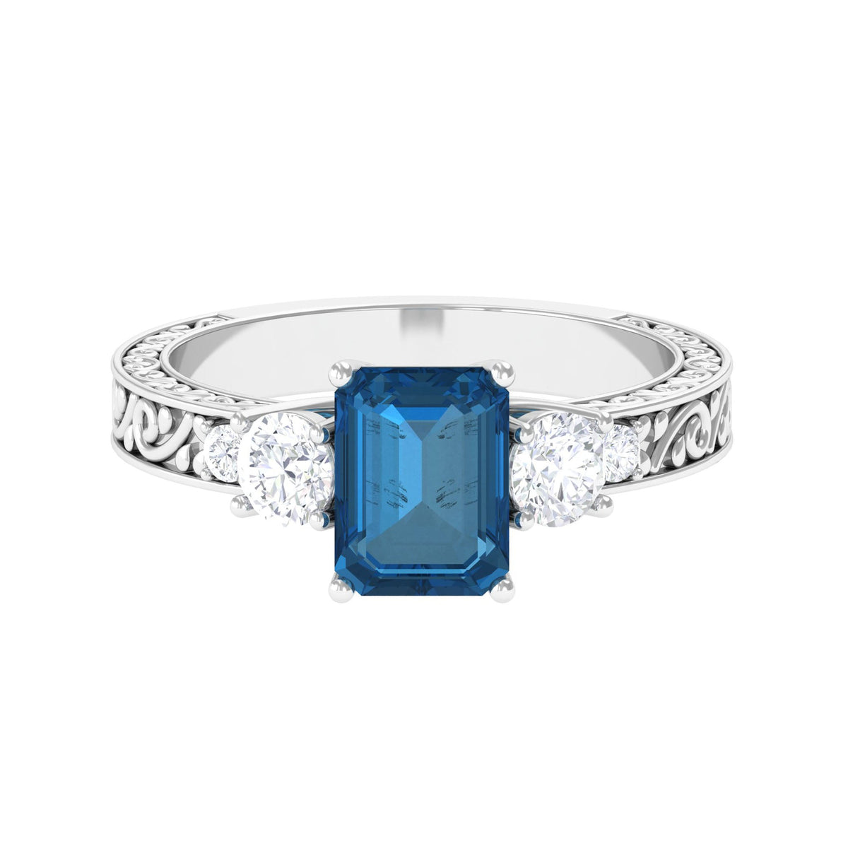 Rosec Jewels 6x8mm London Blue Topaz statement ring with emerald cut and engraved shank, showcasing a vibrant blue gemstone.