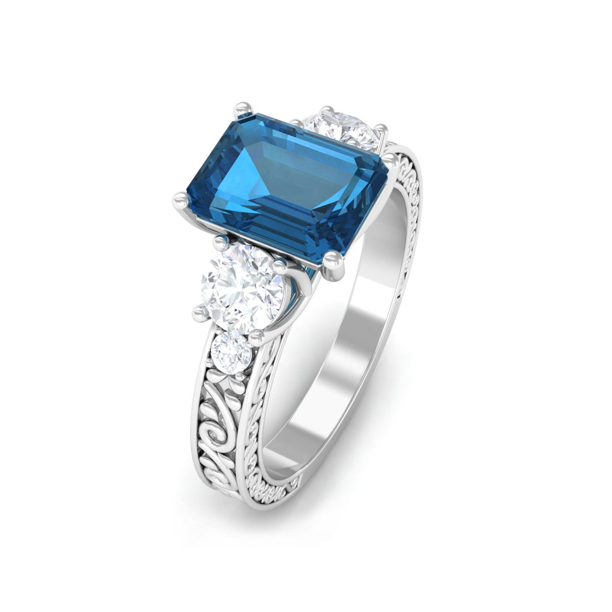 Rosec Jewels 6x8mm London Blue Topaz statement ring with emerald cut and engraved shank, showcasing a bold blue gemstone.