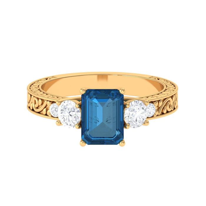 Elegant 6x8mm London Blue Topaz statement ring with engraved shank by Rosec Jewels, showcasing a vibrant emerald cut gemstone.