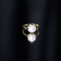 Cultured 7.4 carat freshwater pearl solitaire engagement ring by Rosec Jewels featuring a single elegant pearl on a sleek band.