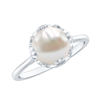 Cultured 7.4 carat freshwater pearl solitaire engagement ring with a silver band, designed by Rosec Jewels.