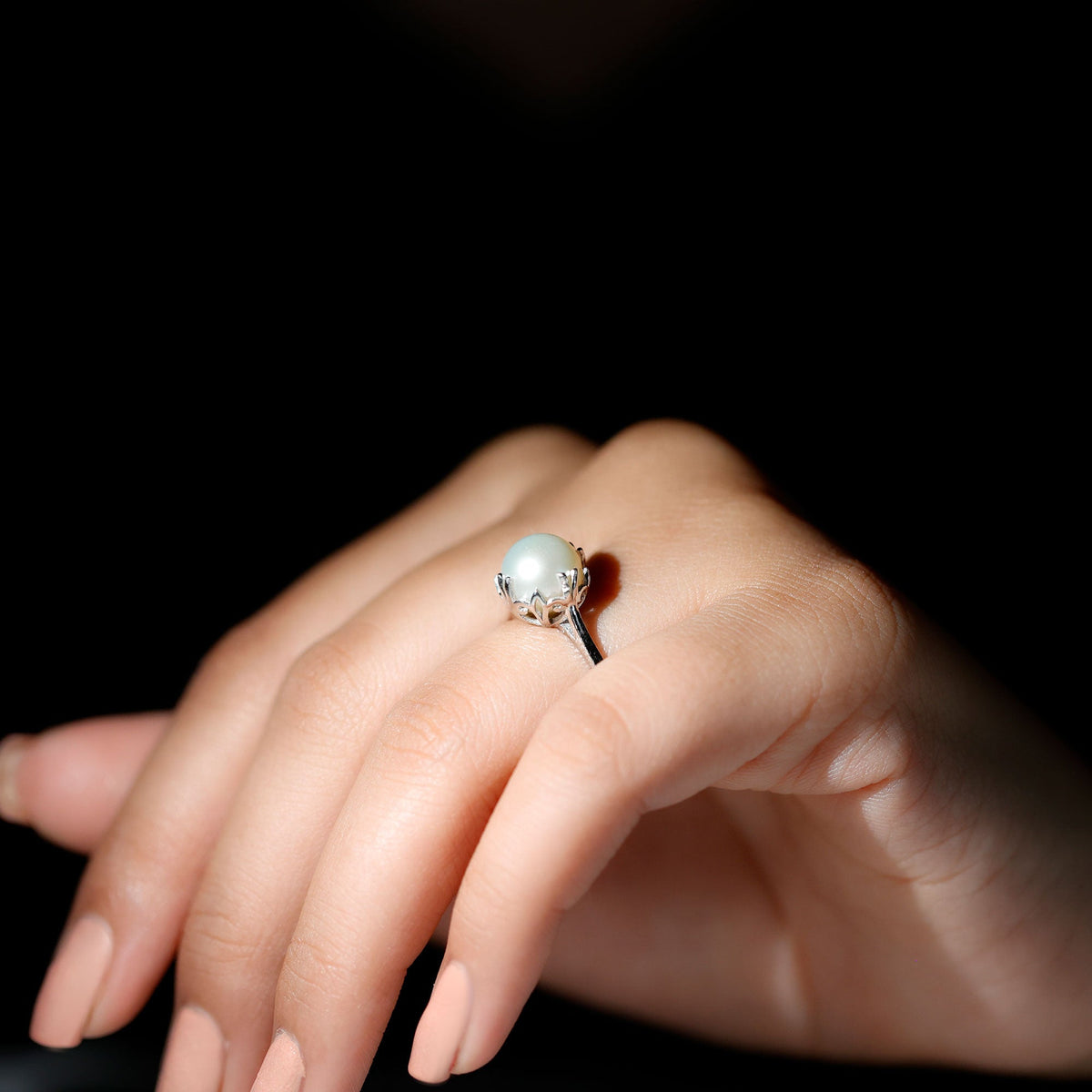 Cultured 7.4 Carat freshwater pearl solitaire engagement ring by Rosec Jewels featuring a classic design and shiny pearl centerpiece.