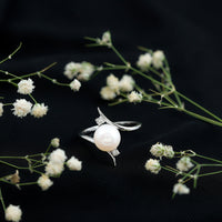 Freshwater pearl engagement ring with 7.4 carats and diamond bypass shank by Rosec Jewels, showcasing elegant jewelry design