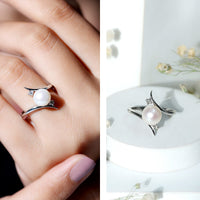 Cultured 7.4 Carat freshwater pearl engagement ring with diamond bypass shank by Rosec Jewels, showcasing elegant design and sparkling accents.