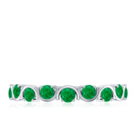 Natural green emerald half eternity stackable ring by Rosec Jewels, featuring a row of vibrant emeralds in a sleek gold band.