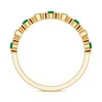 Natural green emerald half eternity stackable ring from Rosec Jewels with a band of emeralds set in silver or gold.