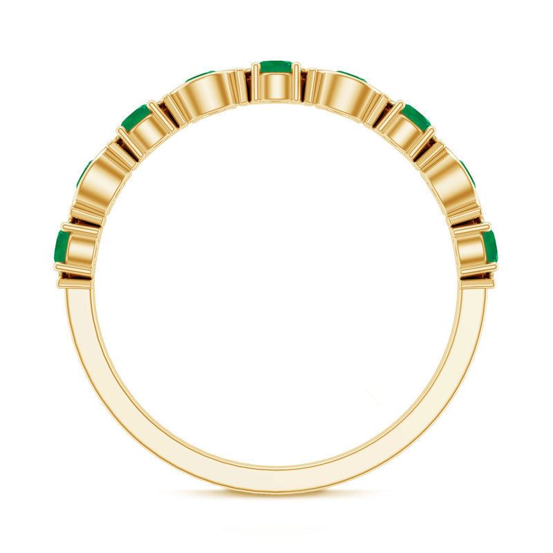Natural green emerald half eternity stackable ring from Rosec Jewels with a band of emeralds set in silver or gold.