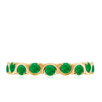 Natural green emerald half eternity stackable ring by Rosec Jewels, featuring a row of vibrant emeralds set in a sleek band.