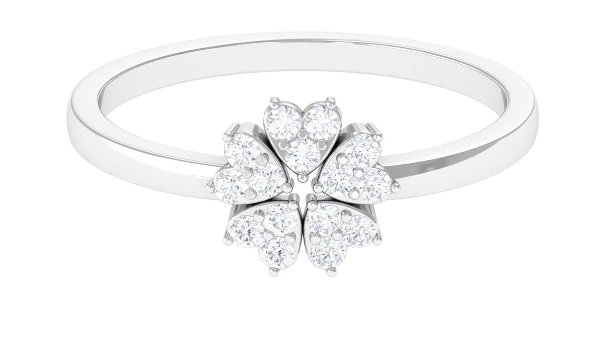 Natural diamond flower promise ring by Rosec Jewels featuring a delicate floral design with sparkling diamonds on a silver band.