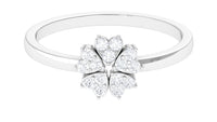 Natural diamond flower promise ring by Rosec Jewels featuring a delicate floral design with sparkling diamonds on a silver band.