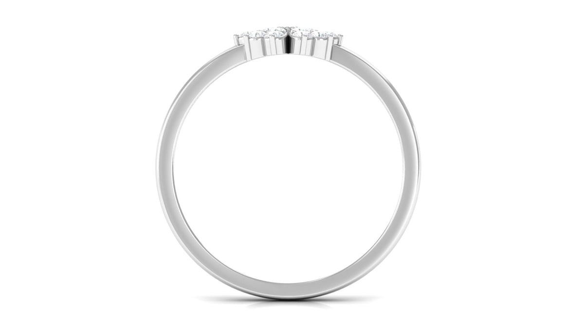 Natural diamond flower promise ring by Rosec Jewels featuring a delicate flower design with sparkling diamonds on a silver band.